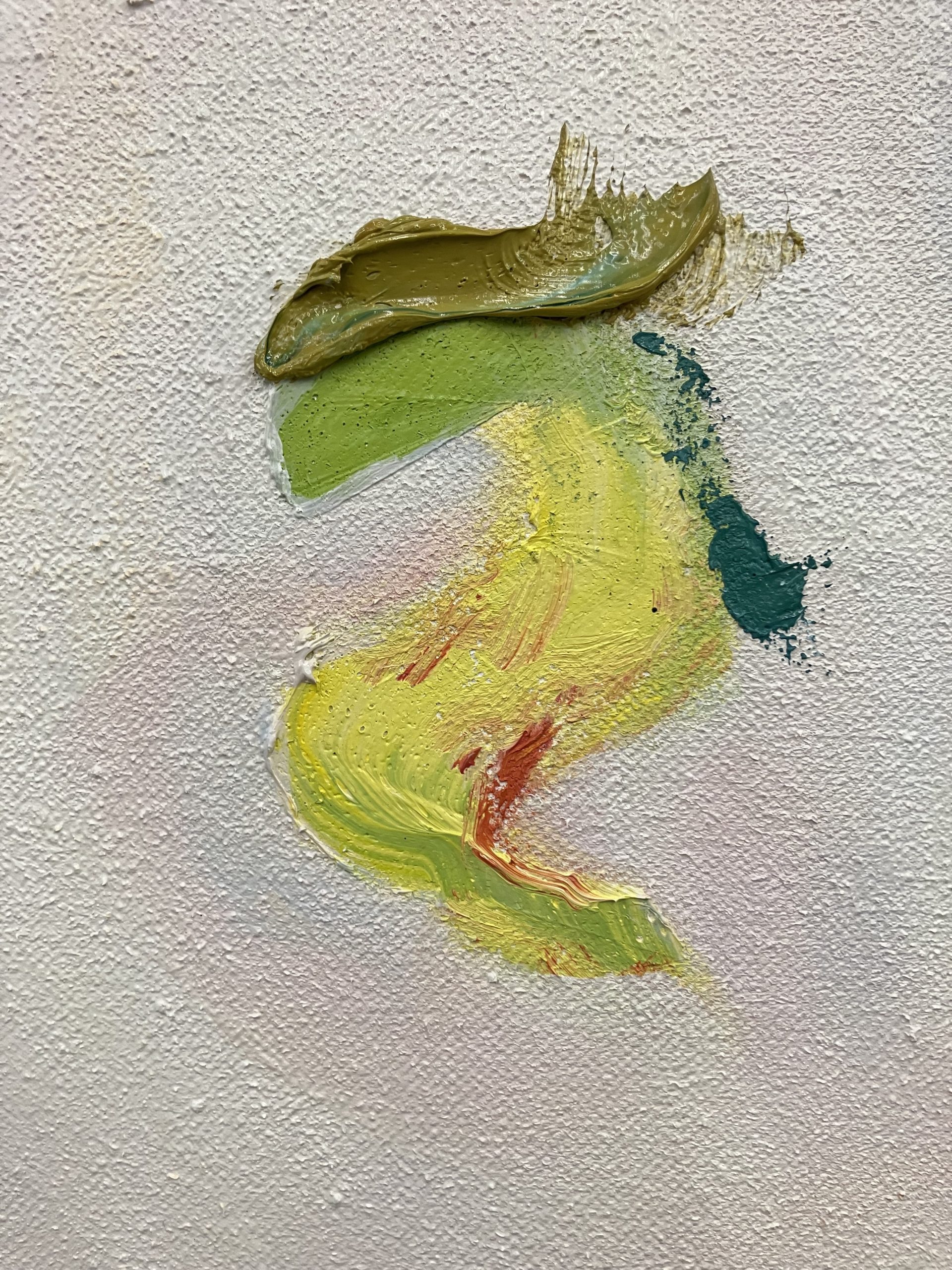 A mostly sunshine yellow S-shape with lime green, forest green, moss green, and a speck of magenta.