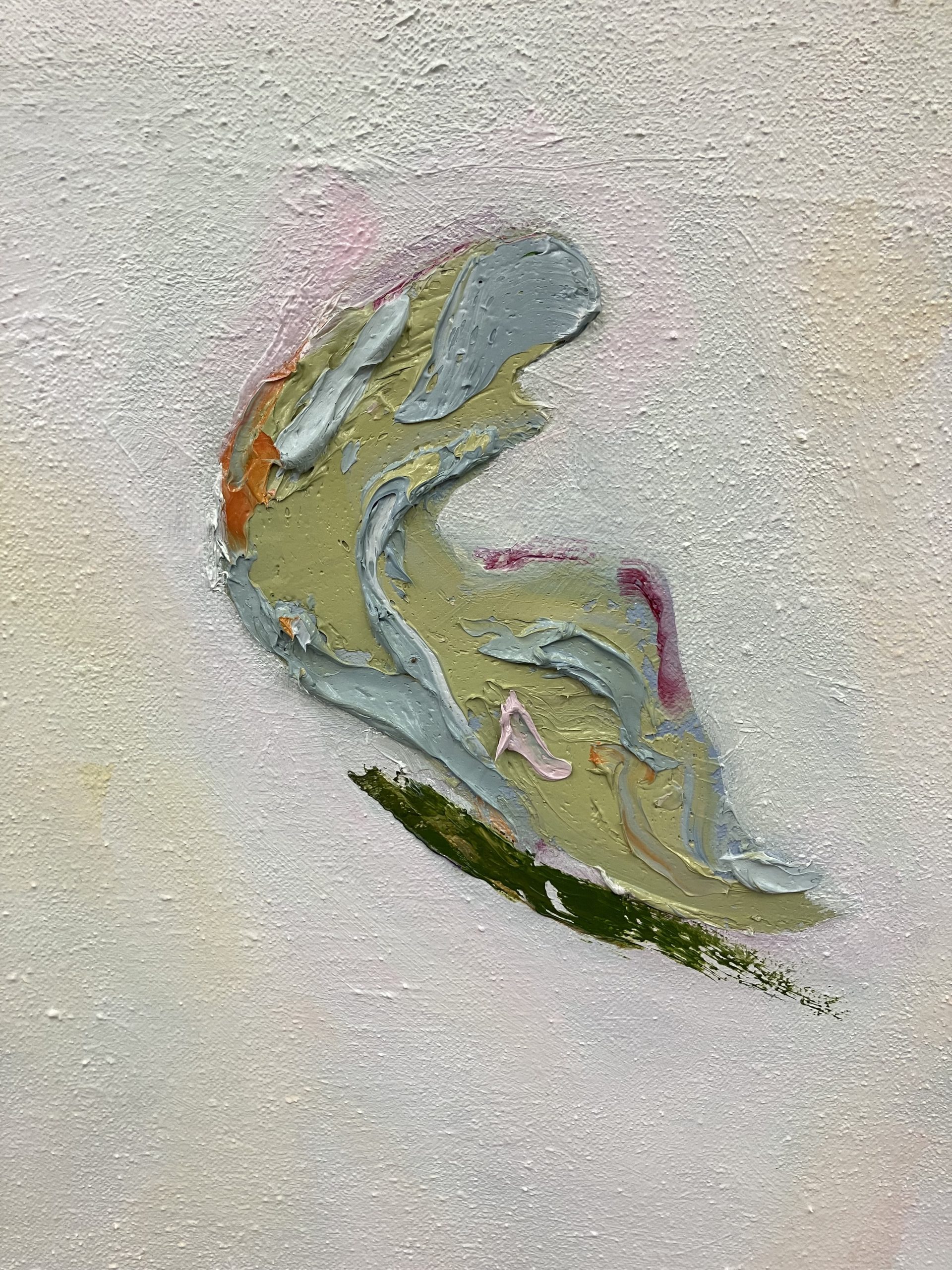A close-up of one the shapes, primarily light green and light blue with some dark green and magenta strokes.
